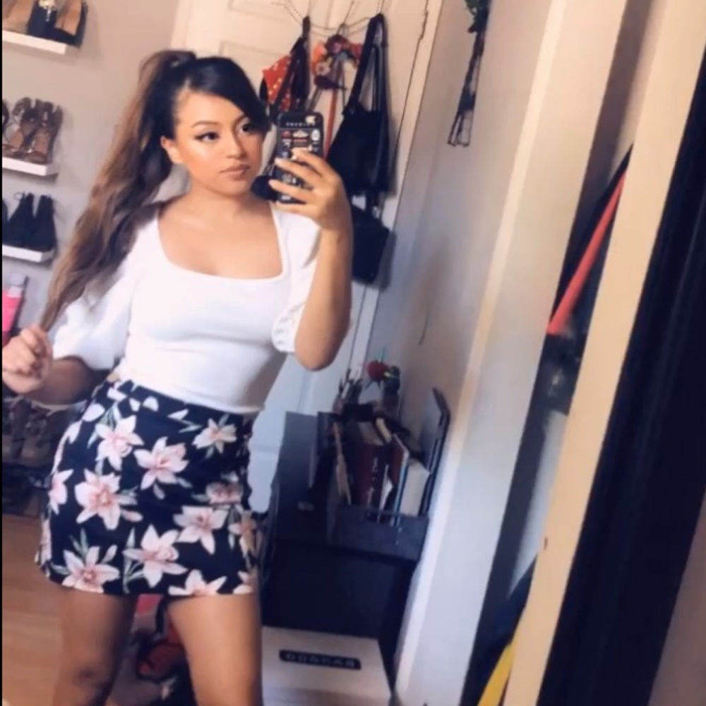 Black floral mini skirt
